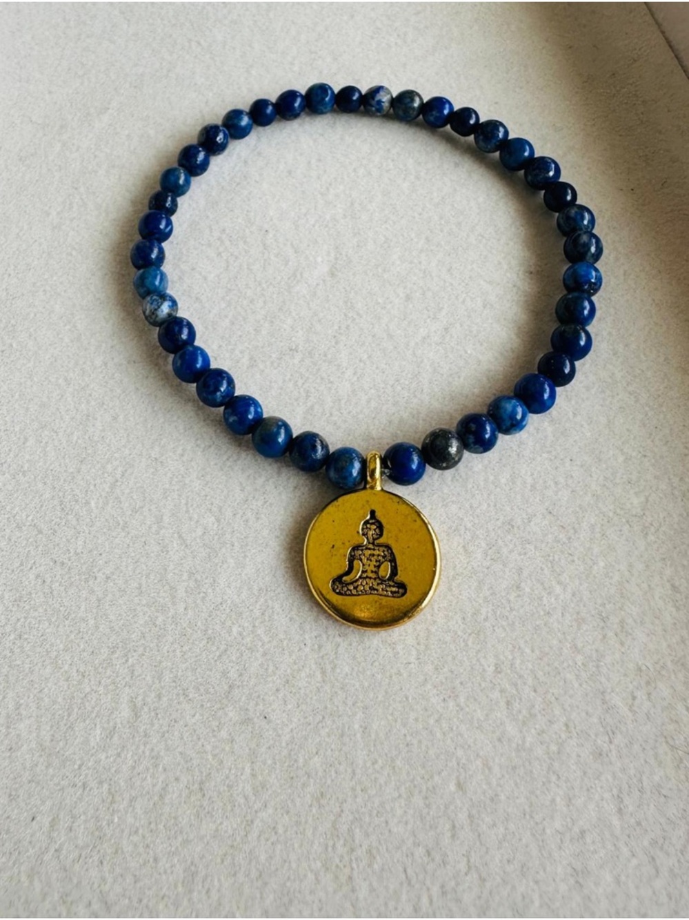 Blue Lapis Lazuli Beaded Bracelet with Gold Buddha Charm